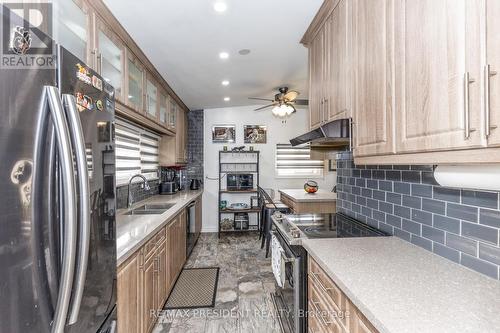 7648 Redstone Road, Mississauga, ON - Indoor Photo Showing Kitchen With Double Sink With Upgraded Kitchen