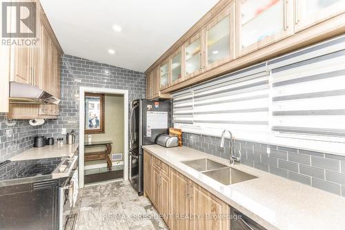 7648 Redstone Road, Mississauga, ON - Indoor Photo Showing Kitchen With Double Sink With Upgraded Kitchen