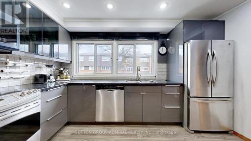 4 Dove Hawk Way, Toronto, ON - Indoor Photo Showing Kitchen With Double Sink