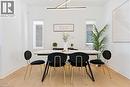 Dining area featuring light wood-style flooring and baseboards - 66 Cesar Place, Ancaster, ON  - Indoor Photo Showing Dining Room 