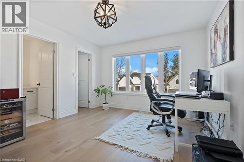 Office with beverage cooler and light wood-style floors - 66 Cesar Place, Ancaster, ON - Indoor Photo Showing Office