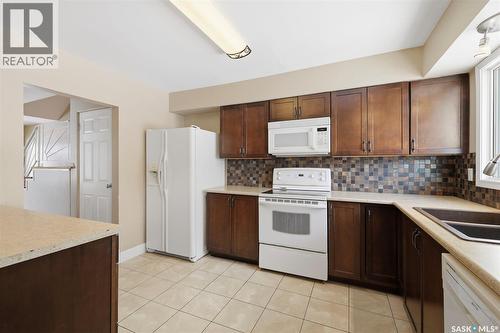 2610 Cascade Street, Saskatoon, SK - Indoor Photo Showing Kitchen With Double Sink