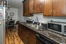 104 1013 Lansdowne Avenue, Saskatoon, SK  - Indoor Photo Showing Kitchen With Double Sink 