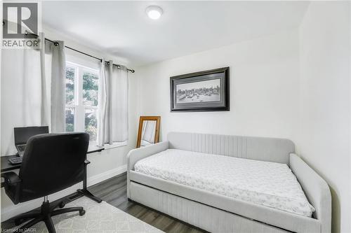 Room featuring a single window, recessed lighting, and wood-finish flooring - 18 Tweedsmuir Avenue, London, ON - Indoor Photo Showing Bedroom