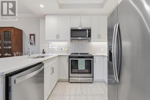 401 - 1200 Commissioners Road W, London South (South B), ON - Indoor Photo Showing Kitchen With Stainless Steel Kitchen With Upgraded Kitchen