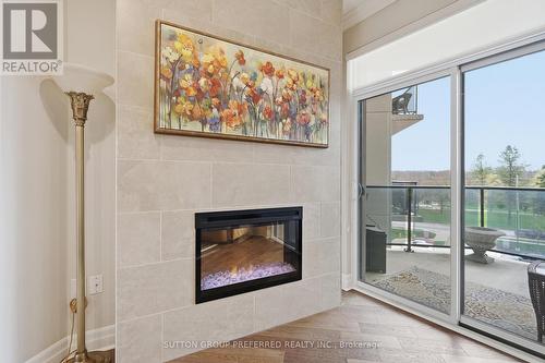 401 - 1200 Commissioners Road W, London South (South B), ON - Indoor With Fireplace