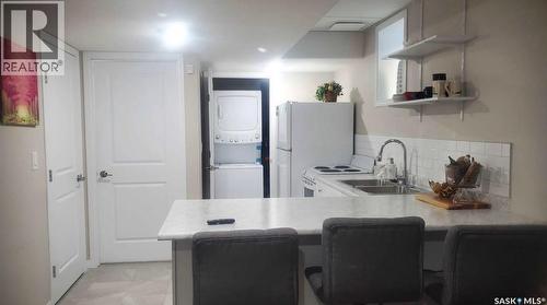 703 Underhill Lane, Saskatoon, SK - Indoor Photo Showing Kitchen With Double Sink