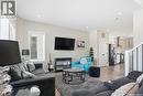 703 Underhill Lane, Saskatoon, SK  - Indoor Photo Showing Living Room With Fireplace 