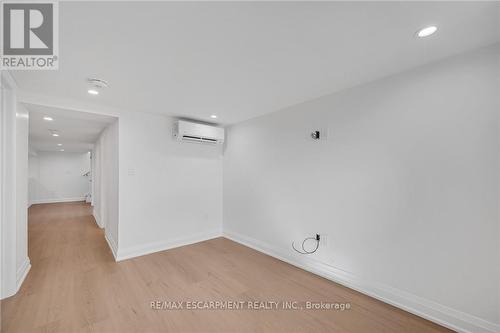 Heat Pump for Heating and Cooling - 1339 Augustine Drive, Burlington, ON - Indoor Photo Showing Other Room