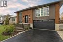 View of front of property with an attached garage, asphalt driveway, and brick siding - 364 Roselawn Place, Waterloo, ON  - Outdoor With Facade 