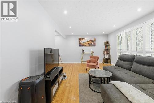 Living room with light wood finished floors and recessed lighting - 364 Roselawn Place, Waterloo, ON - Indoor Photo Showing Living Room