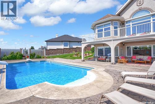 1453 Normandy Drive, Moose Jaw, SK - Outdoor With In Ground Pool With Deck Patio Veranda