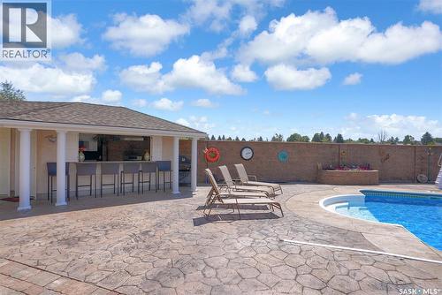 1453 Normandy Drive, Moose Jaw, SK - Outdoor With In Ground Pool With Deck Patio Veranda