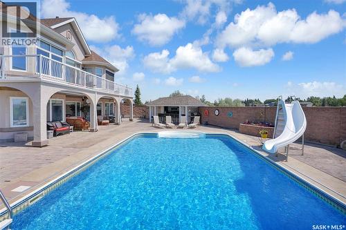 1453 Normandy Drive, Moose Jaw, SK - Outdoor With In Ground Pool With Deck Patio Veranda