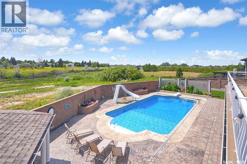 1453 Normandy Drive, Moose Jaw, SK - Outdoor With In Ground Pool With Deck Patio Veranda With View