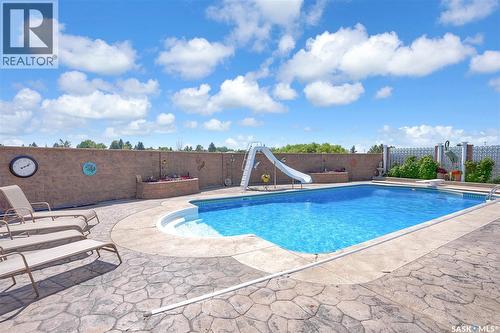 1453 Normandy Drive, Moose Jaw, SK - Outdoor With In Ground Pool With Deck Patio Veranda