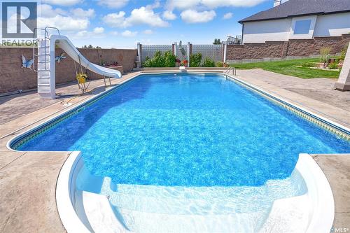 1453 Normandy Drive, Moose Jaw, SK - Outdoor With In Ground Pool With Deck Patio Veranda