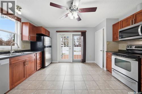 107 Evans Street, Saskatoon, SK - Indoor Photo Showing Kitchen With Double Sink