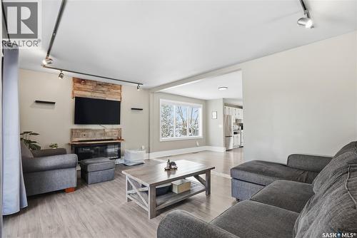 210 Cruise Street, Saskatoon, SK - Indoor Photo Showing Living Room With Fireplace