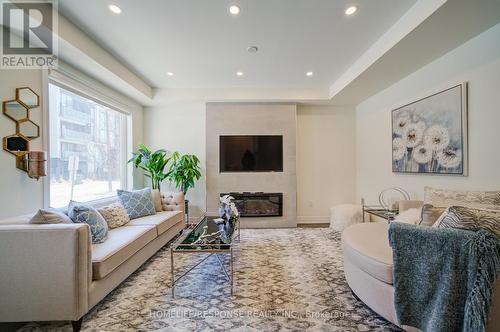 31 - 3023 Creekshore Common, Oakville, ON - Indoor Photo Showing Living Room With Fireplace