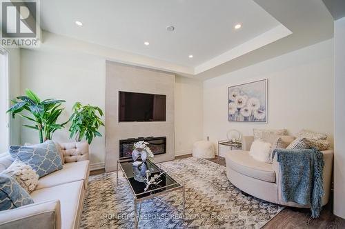 31 - 3023 Creekshore Common, Oakville, ON - Indoor Photo Showing Living Room With Fireplace