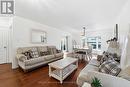 420 Armstrong Street W, North Perth, ON  - Indoor Photo Showing Living Room 