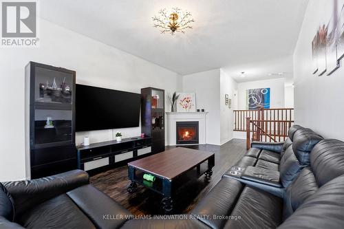 420 Armstrong Street W, North Perth, ON - Indoor Photo Showing Living Room With Fireplace