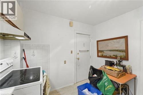 Separate Side Door Entrance From The Kitchen - 509 Aberdeen Avenue, Hamilton, ON - Indoor Photo Showing Laundry Room