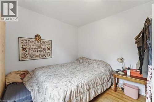 Bright room featuring light wood-finish flooring and white painted walls - 509 Aberdeen Avenue, Hamilton, ON - Indoor Photo Showing Bedroom
