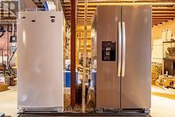 Stand up freezer and 2nd fridge Included in sale - 