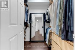 Primary walk in closet - 