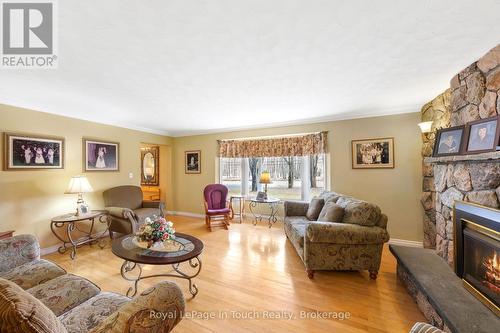 Living Space - 756 Champlain Road, Tiny, ON - Indoor Photo Showing Living Room With Fireplace