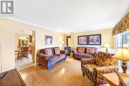 Family Room with Gas Stove - 756 Champlain Road, Tiny, ON - Indoor Photo Showing Living Room