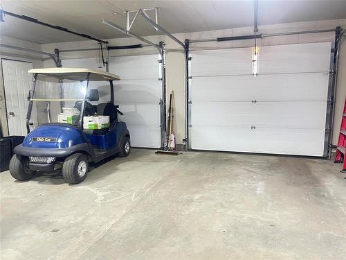 37 Bluebird Crescent, Brandon, MB - Indoor Photo Showing Garage
