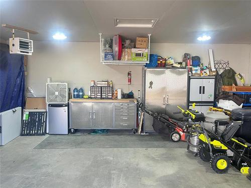 37 Bluebird Crescent, Brandon, MB - Indoor Photo Showing Garage