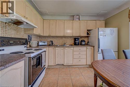 18 Norfolk Street N, Hamilton, ON - Indoor Photo Showing Kitchen With Double Sink