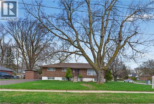 Brick-front exterior with a brown shingle roof - 53 Nicklin Crescent, Guelph, ON - Outdoor