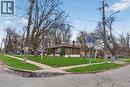 Corner lot featuring a brick exterior and a green lawn - 53 Nicklin Crescent, Guelph, ON  - Outdoor 