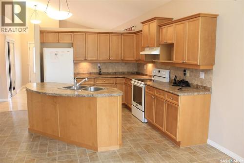 218 802 Heritage Crescent, Saskatoon, SK - Indoor Photo Showing Kitchen With Double Sink