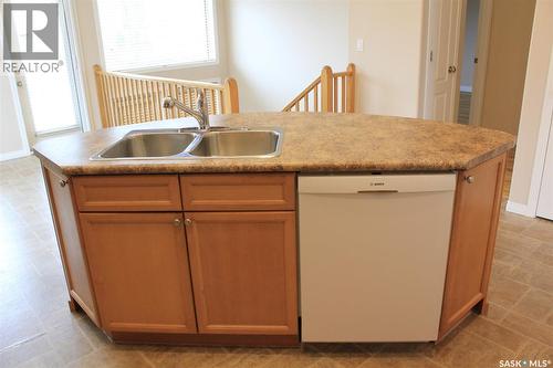 218 802 Heritage Crescent, Saskatoon, SK - Indoor Photo Showing Kitchen With Double Sink