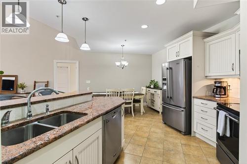 1550 Venetian Boulevard Unit# 310, Point Edward, ON - Indoor Photo Showing Kitchen With Double Sink With Upgraded Kitchen