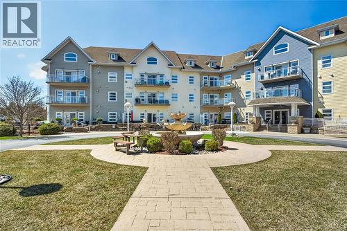 1550 Venetian Boulevard Unit# 310, Point Edward, ON - Outdoor With Balcony With Facade