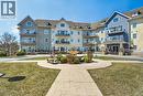 1550 Venetian Boulevard Unit# 310, Point Edward, ON  - Outdoor With Balcony With Facade 