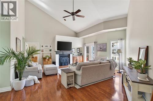 1550 Venetian Boulevard Unit# 310, Point Edward, ON - Indoor Photo Showing Living Room With Fireplace