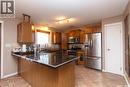 10314 Bunce Crescent, North Battleford, SK  - Indoor Photo Showing Kitchen With Double Sink 