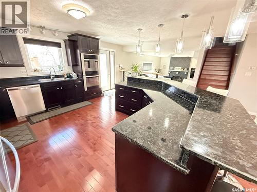 787 Brimacombe Drive, Weyburn, SK - Indoor Photo Showing Kitchen With Double Sink With Upgraded Kitchen