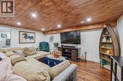 Reclaimed wood-finish ceiling with recessed lighting - 