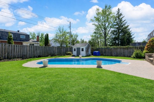 Cour - 30 Rue Hamlet, Dollard-Des-Ormeaux, QC - Outdoor With In Ground Pool With Backyard