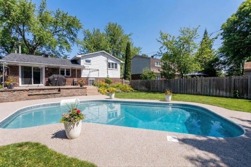 Piscine - 30 Rue Hamlet, Dollard-Des-Ormeaux, QC - Outdoor With In Ground Pool With Deck Patio Veranda With Backyard