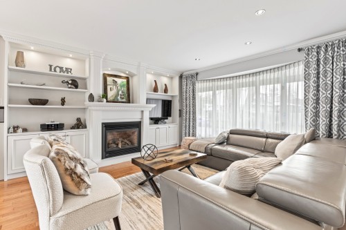 Salon - 30 Rue Hamlet, Dollard-Des-Ormeaux, QC - Indoor Photo Showing Living Room With Fireplace